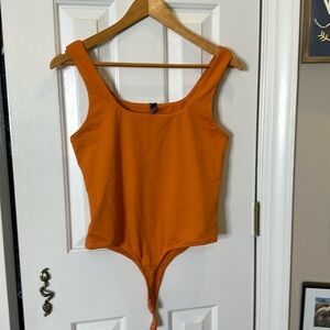 Alya XL thong bodysuit in burnt orange